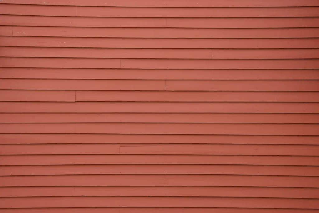 A red brick wall cleaned of dirt, mildew and efflorescence