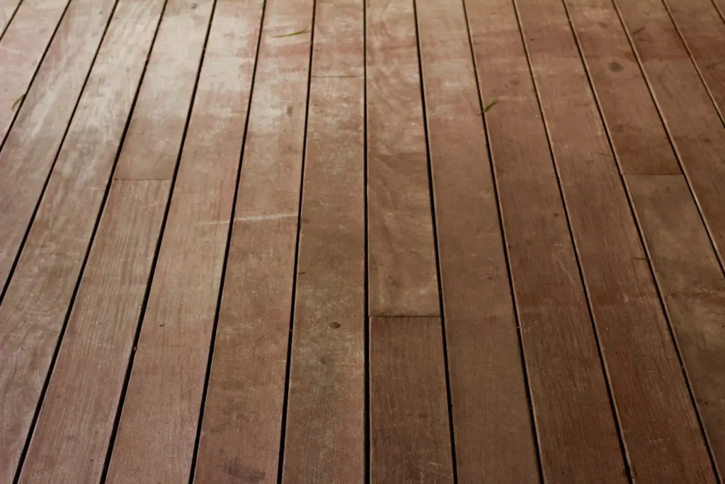 Close-up of clean wooden deck boards after pressure washing
