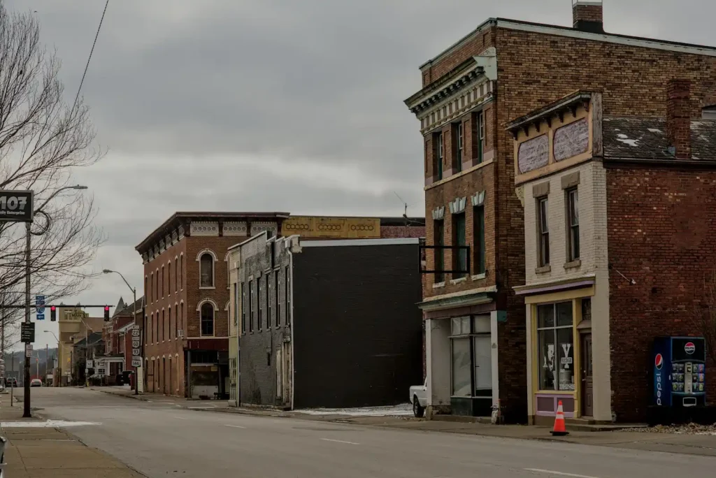 A row of brick apartment and HOA buildings maintained with commercial pressure washing