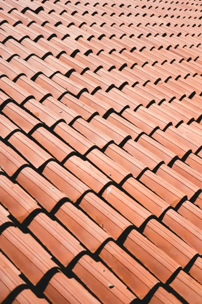 Clean brown roof tiles after a professional roof cleaning
