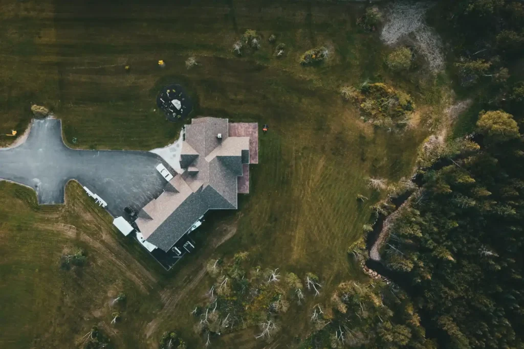 Aerial view of a suburban house and driveway