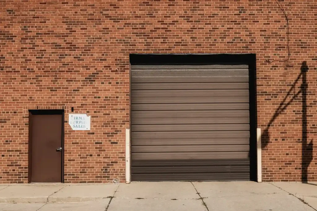 Brick industrial building with a service door