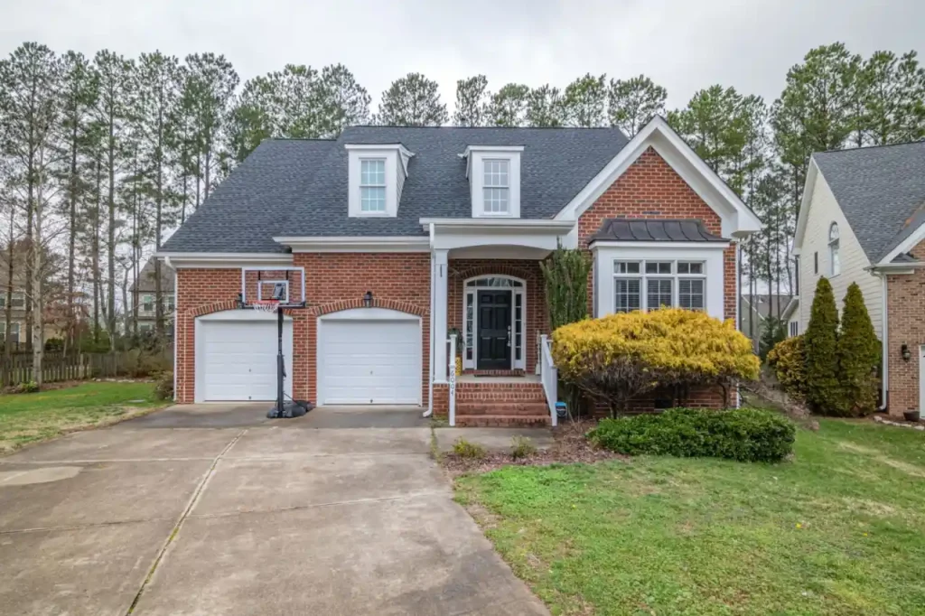 Brick suburban home with a garage