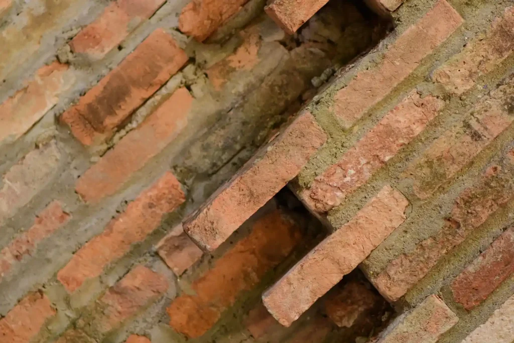 Brick wall with uneven layers