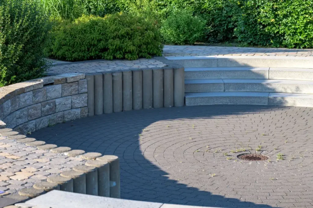 Circular stone patio with steps