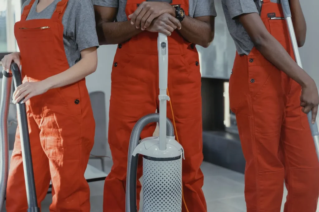 Cleaning technicians with equipment ready for a job