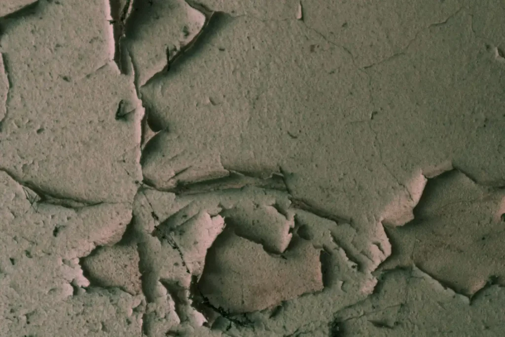 Cracked and textured plaster wall