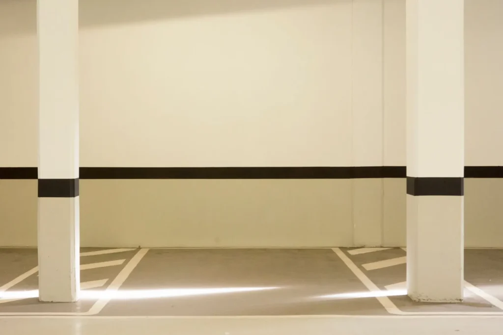 Dimly lit underground parking garage