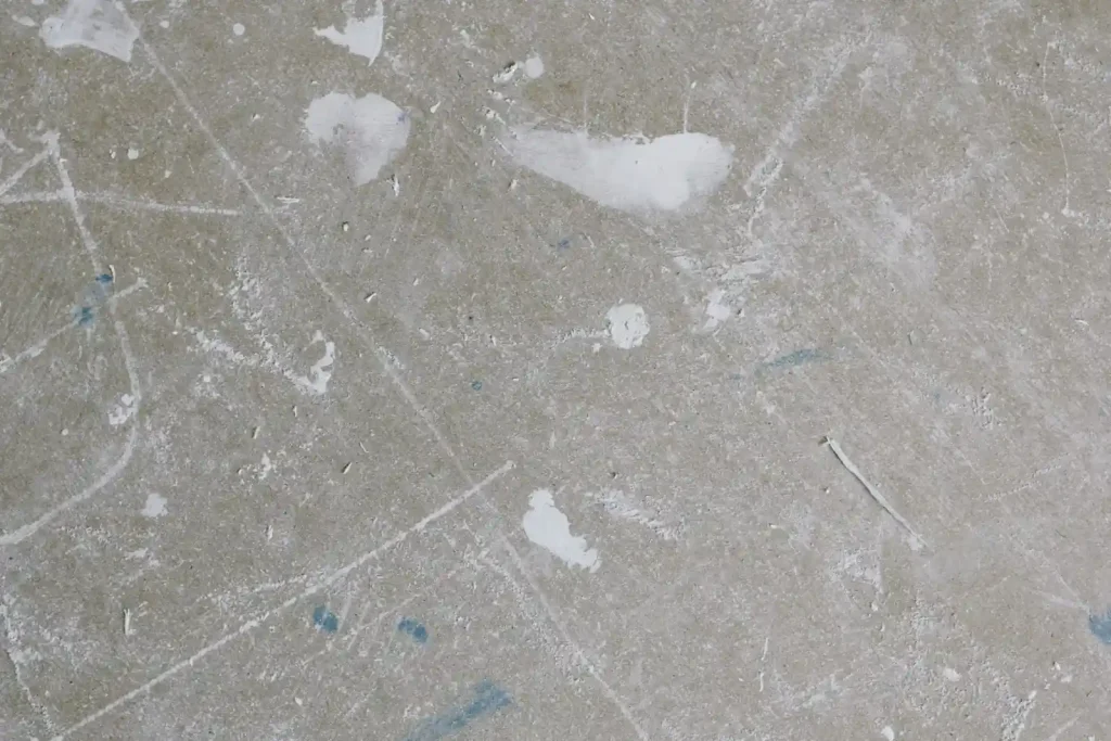 Dirty uneven wall surface before cleaning