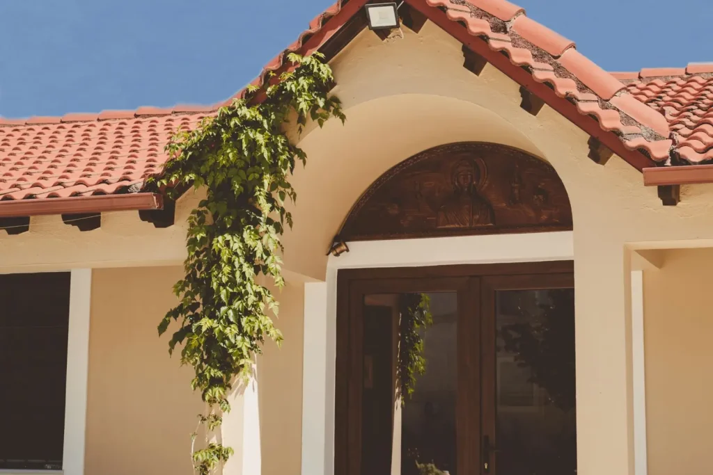 Mediterranean house entrance with a tiled roof