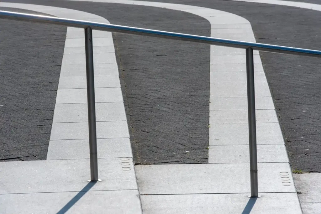 Metal railing along a contemporary deck