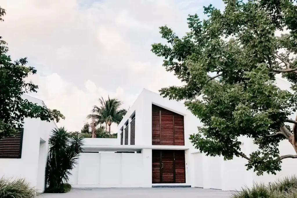 Minimalist home exterior with open driveway