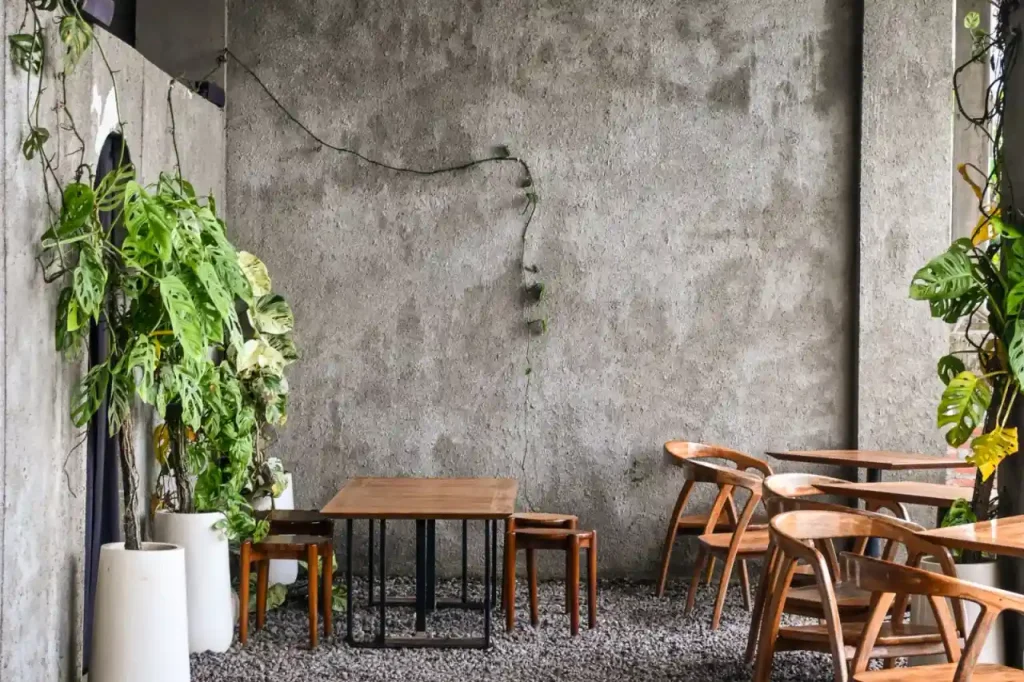 Modern outdoor cafe terrace with concrete paving