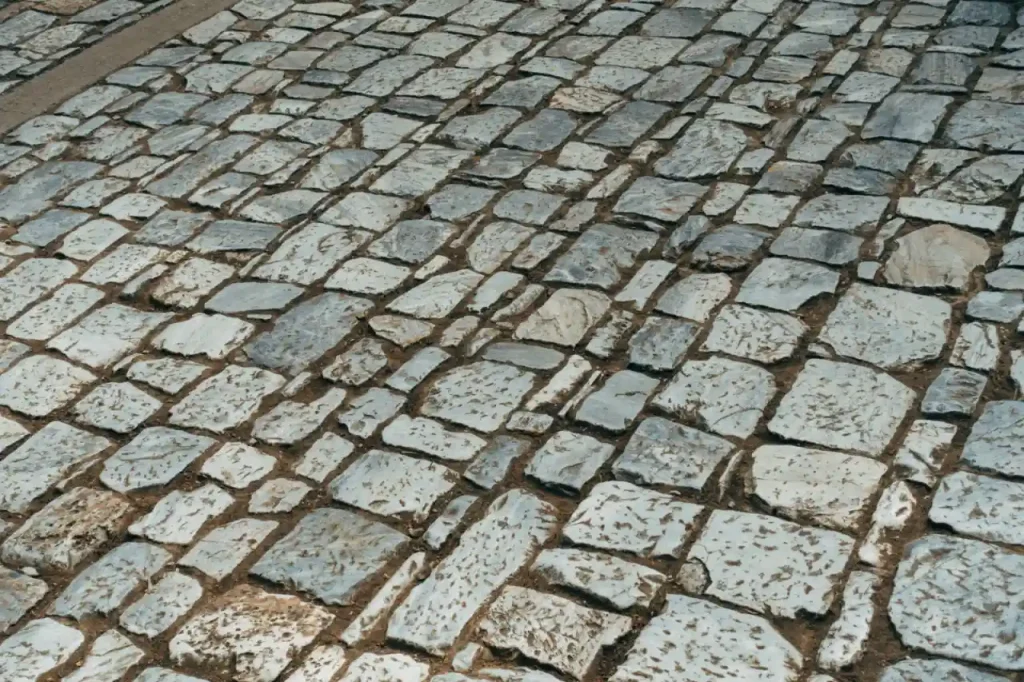 Old cobblestone path with granite stones