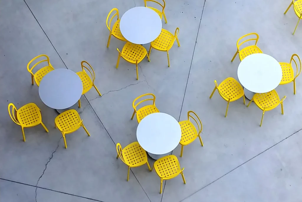 Outdoor seating area on a clean concrete surface