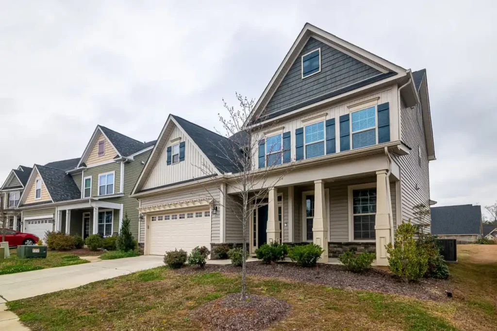 Row of modern suburban homes with driveways