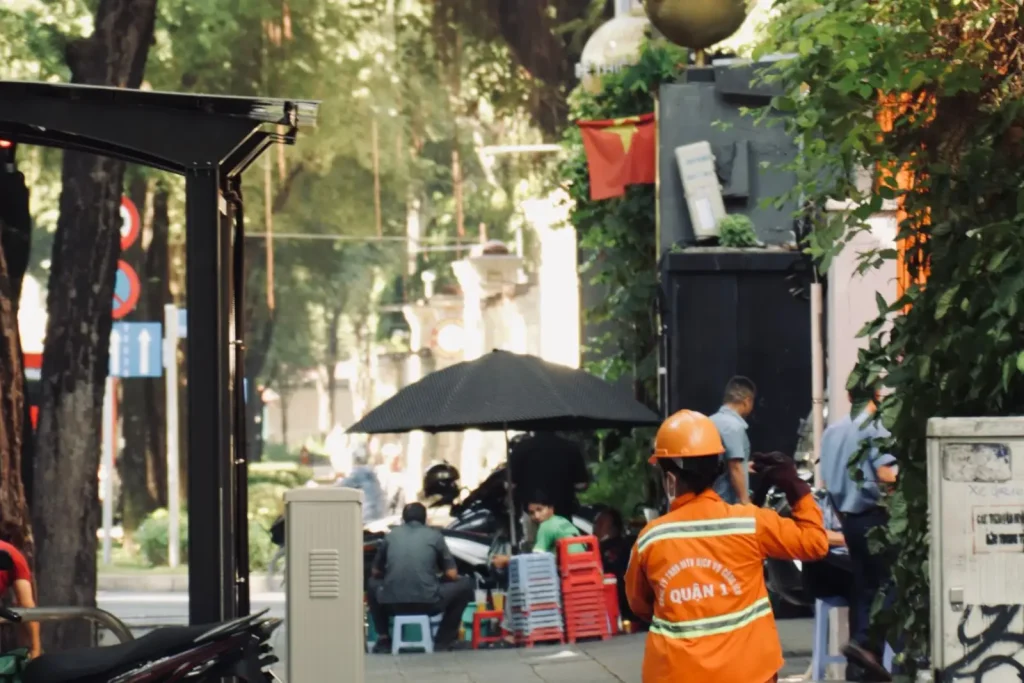 Street worker cleaning a city street