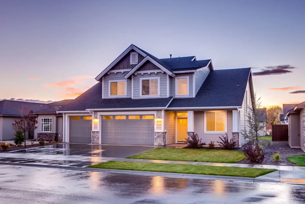 Suburban home with a driveway at sunset