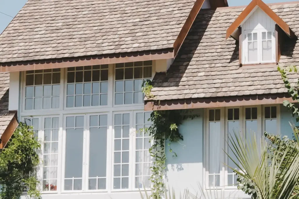 Suburban house with a shingled slate roof