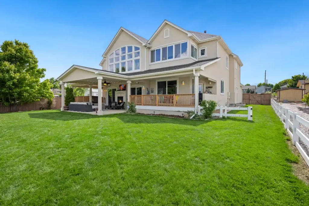 Two storey suburban house with a large lawn