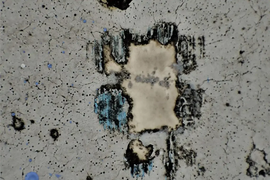 Weathered concrete wall showing cracks