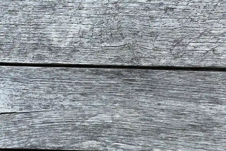 Weathered wooden planks before restoration