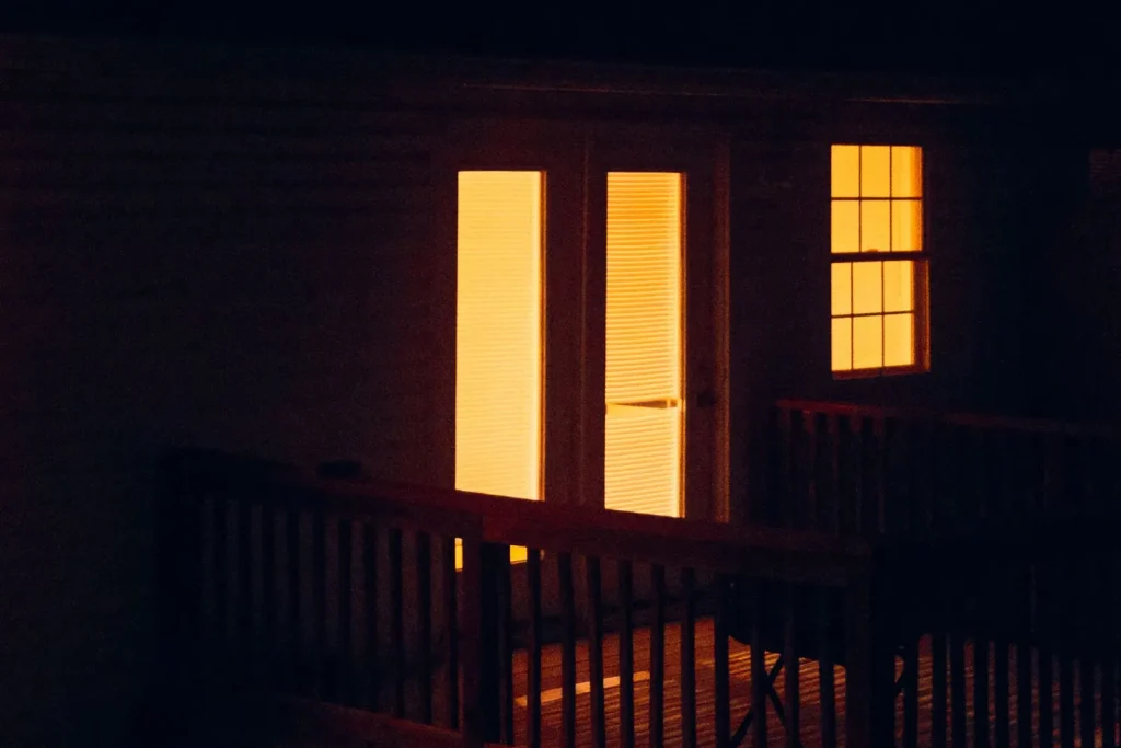 Wooden terrace lit at night